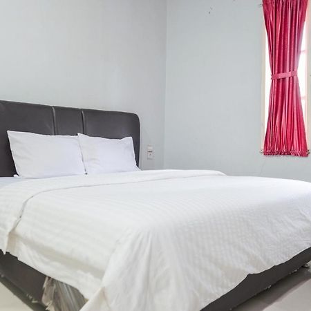 Djaboerigin Mongonsidi Guest House Redpartner 棉兰 外观 照片