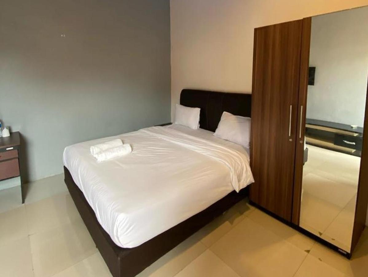 Djaboerigin Mongonsidi Guest House Redpartner 棉兰 外观 照片