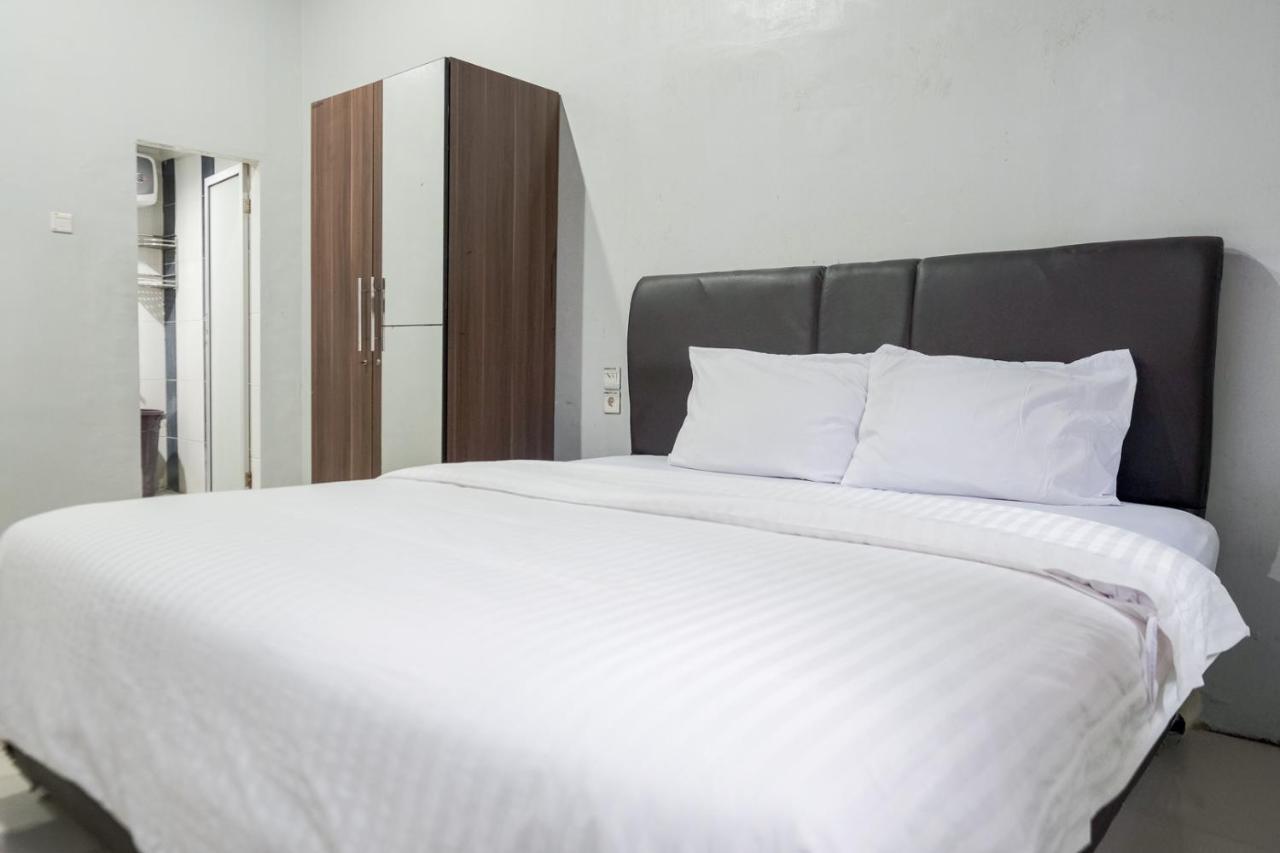 Djaboerigin Mongonsidi Guest House Redpartner 棉兰 外观 照片